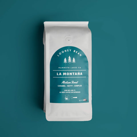 Looney Bean Mammoth medium roast coffee bag with blue background. Roasted in Mammoth Lakes